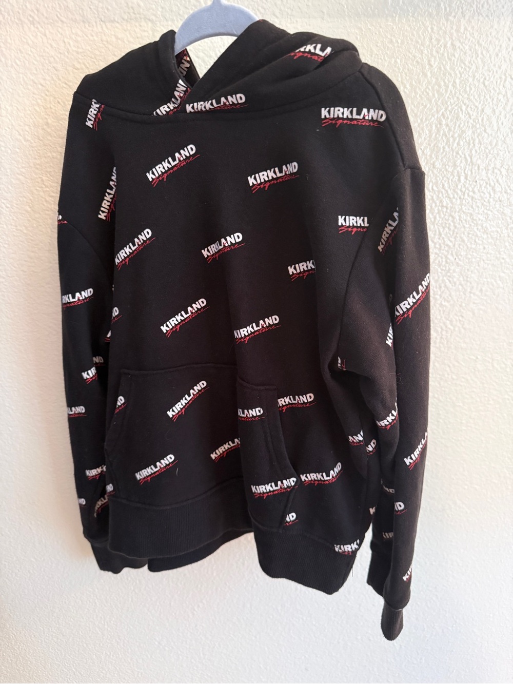 Kirkland Signature Black Hoodie with White and Red Logo Print
